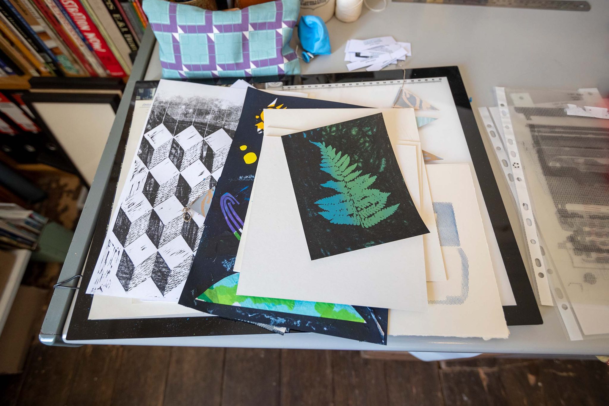 Assorted prints on a table