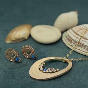 Custom remodel of heirloom jewellery in gold diamonds and sapphires