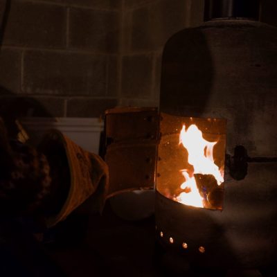 Lighting the stove in the workshop
