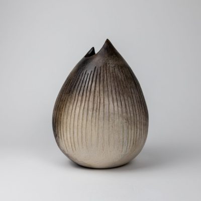 Pod. Smoke-fired, carved ceramic vessel