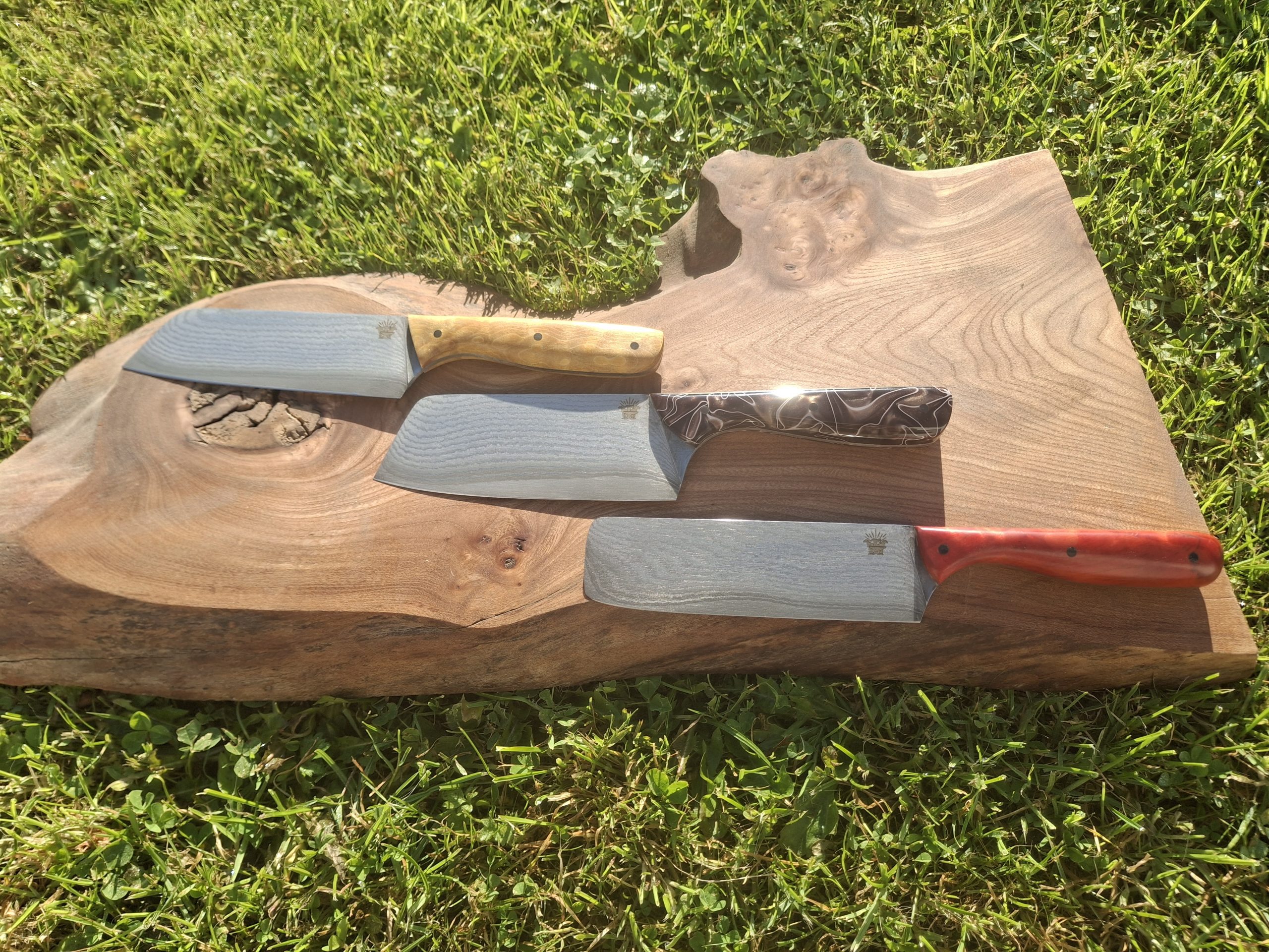 Trio of stainless steel Damascus chef's knives